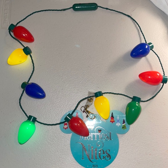 DisneyParks Exclusive Disney Merriest Nites 2021 Lights Necklace COLLECTORS ITEM - Picture 1 of 6